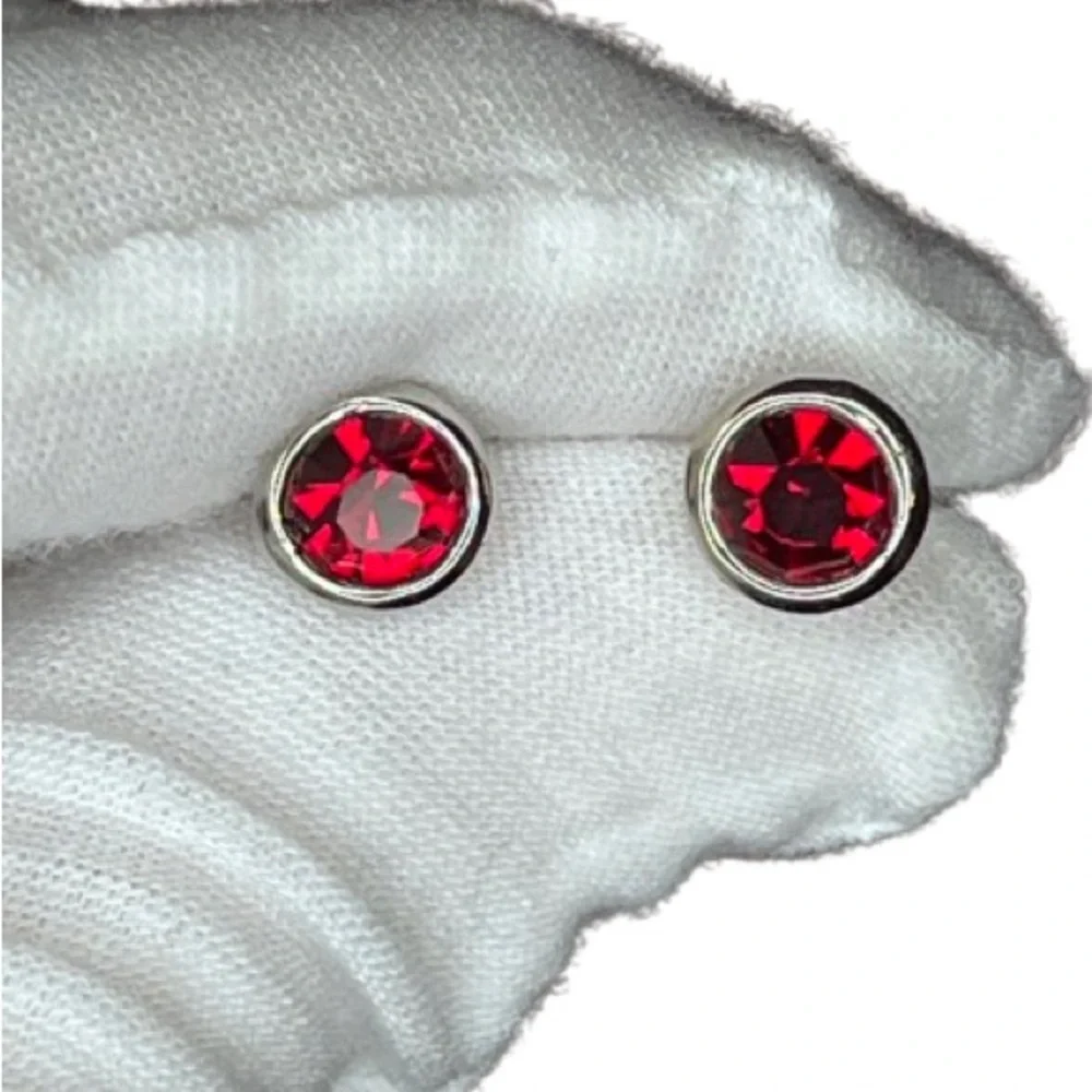 Cufflinks with St. George’s Cross pattern on green background